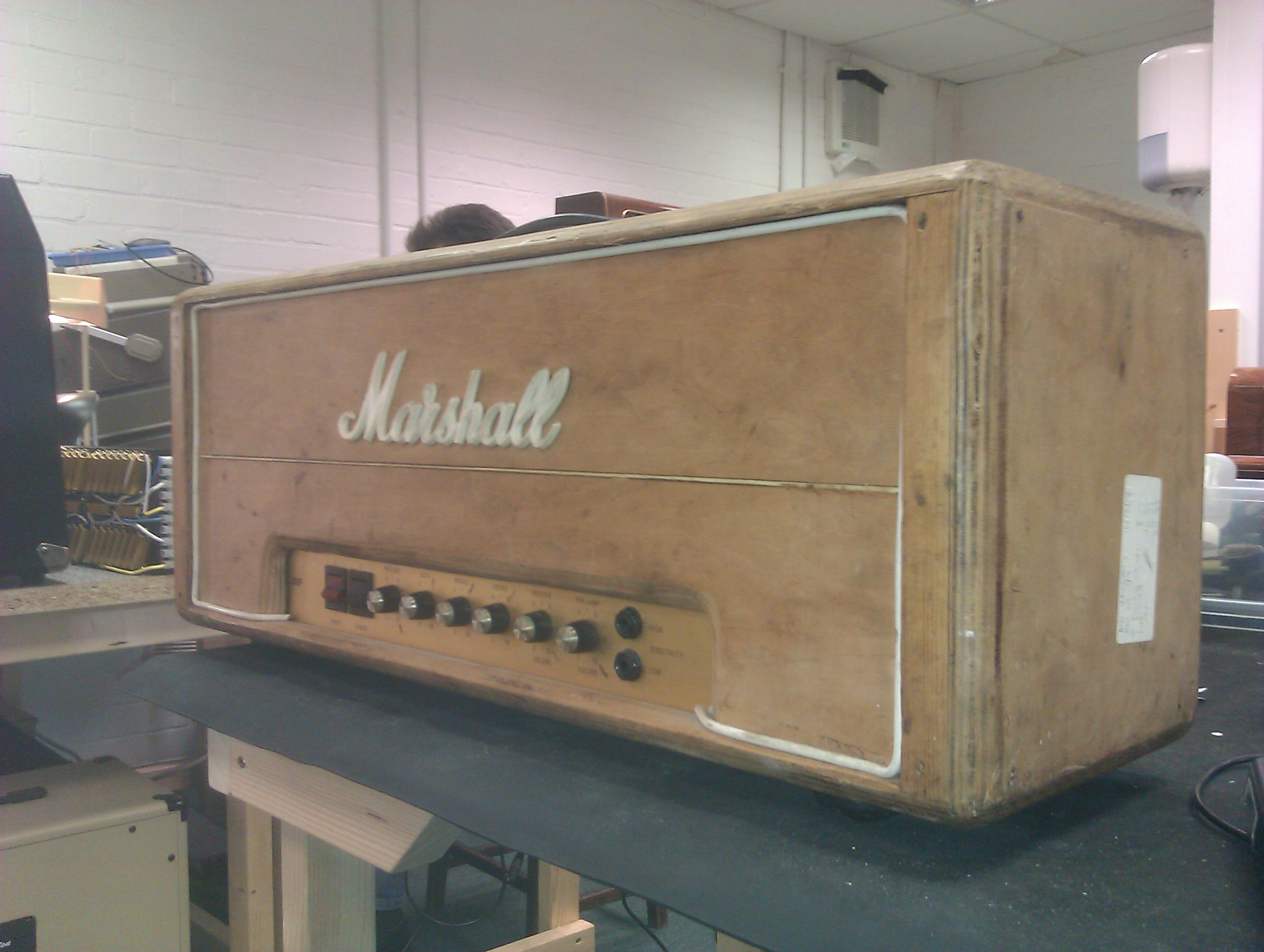 This nice old amp came in with the naked look.