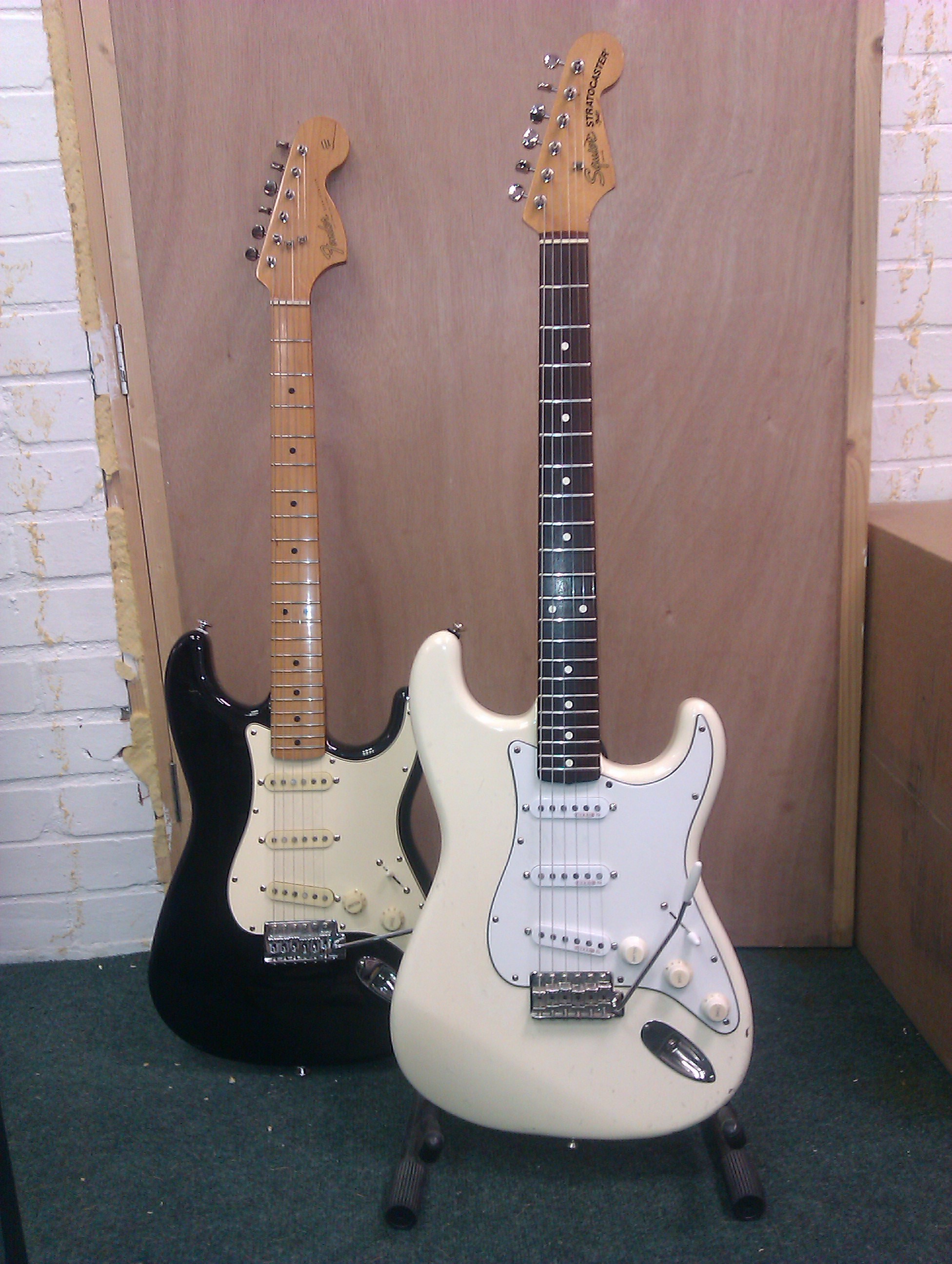 A pair of classic style Strats